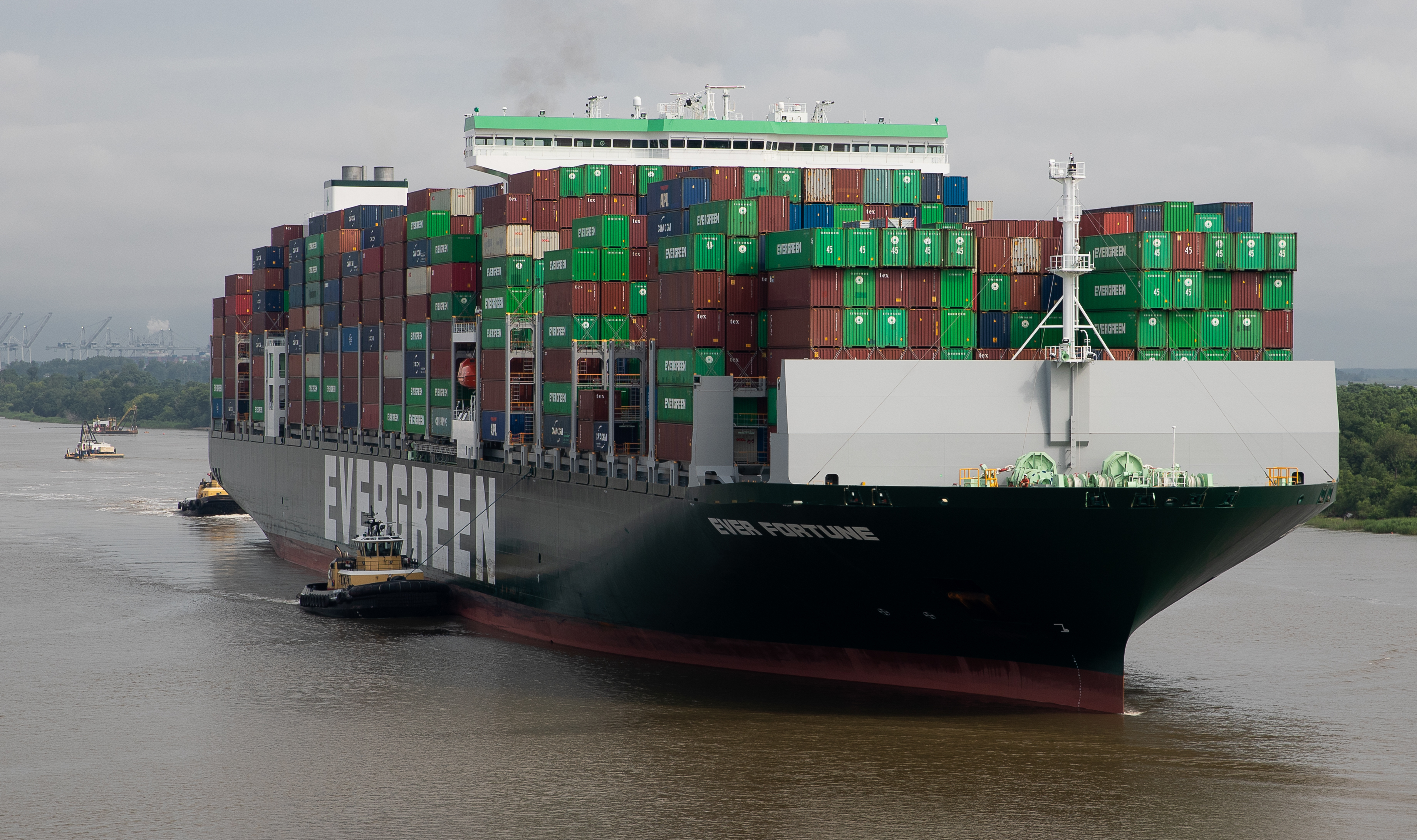 a big boat with lots of shipping containers